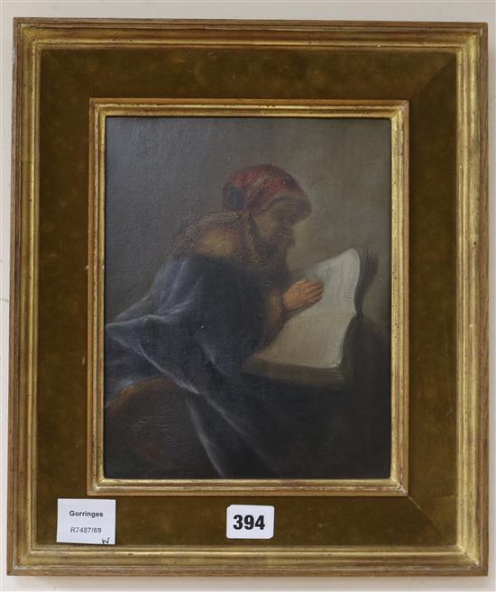 19th century Continental School An old woman reading a book 26 x 21cm